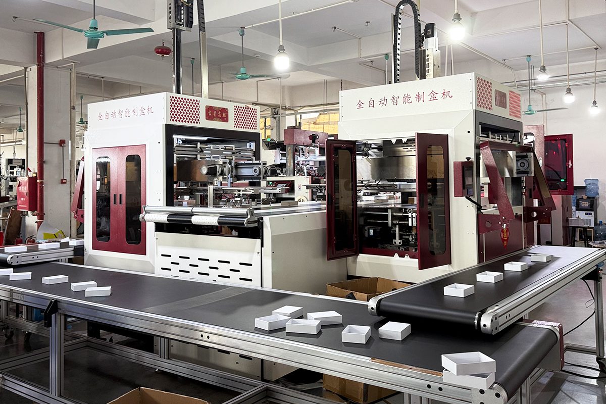 Automatic box-making machine at work in the workshop