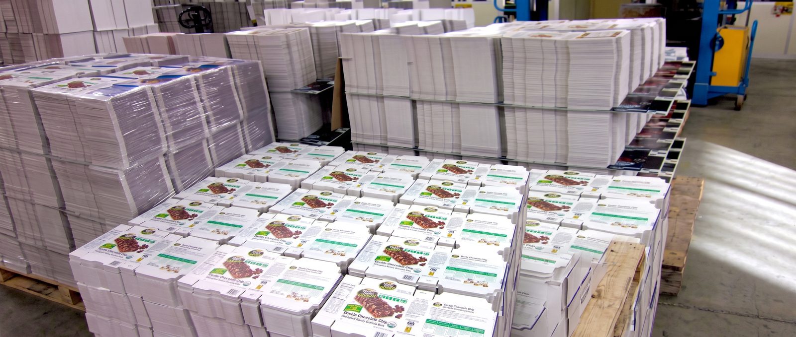 Packed bulk orders stacked on pallets, ready for shipment
