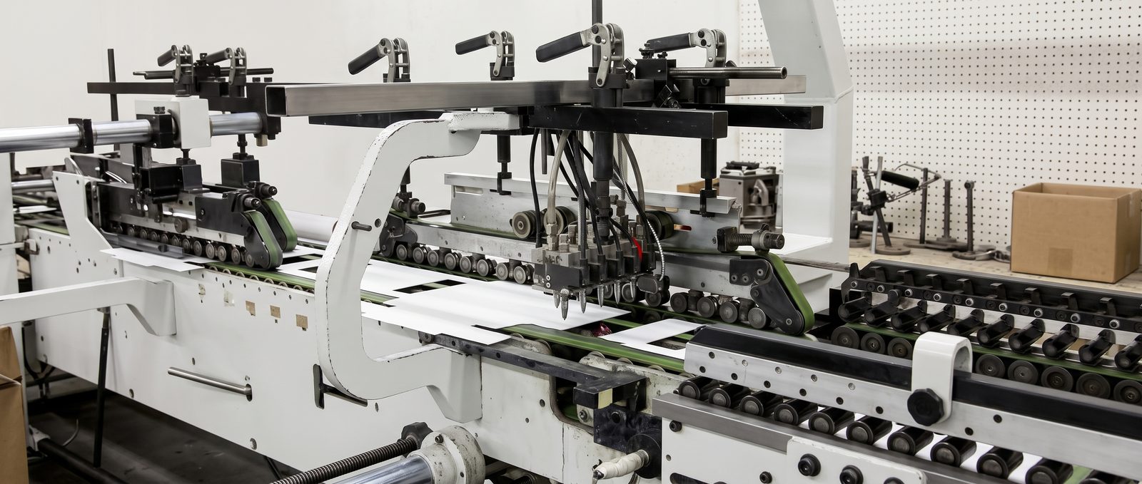 Die-cutting box blanks on the cutting line