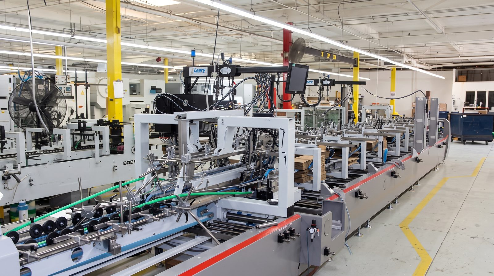 Folding and gluing line in the converting workshop