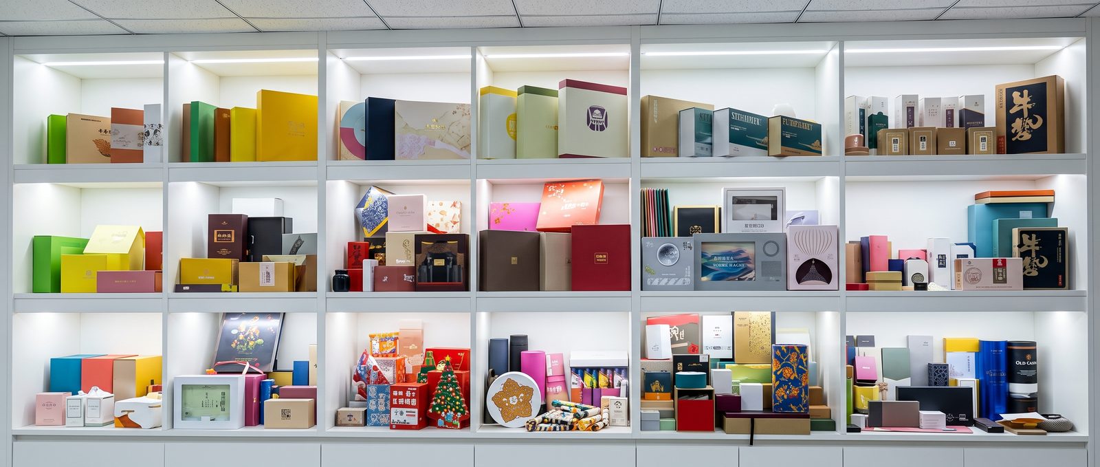 Wall of printed box samples across categories in our sample room